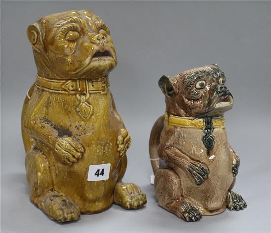 Two Continental pottery jugs, modelled as seated pugs, late 19th century, 25.5cm